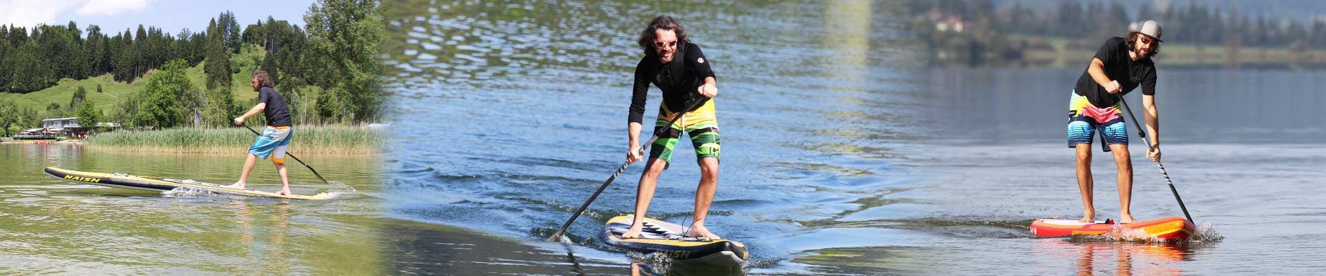 Stand Up Paddler mit Naish One und Fanatic Ray Air Premium